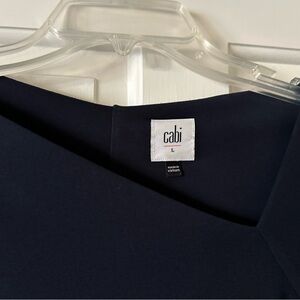Navy long sleeved tee shirt with asymmetric neckline and shelf support